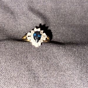 Sapphire & baguettes  diamonds equal just under .5 carat, sapphire  1 carat.